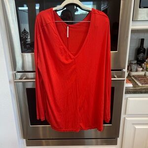 Free People Vivid Red Deep V-Neck Tunic, size M, has slight wear